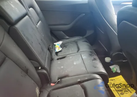 2024 Tesla Model Y из США, поврежденный, VIN 7SAYGAEE9RF015994